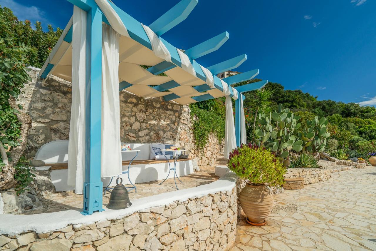 Askos Stone Villa - The Island Panorama อายิโอสนิโกลาโอส ภายนอก รูปภาพ