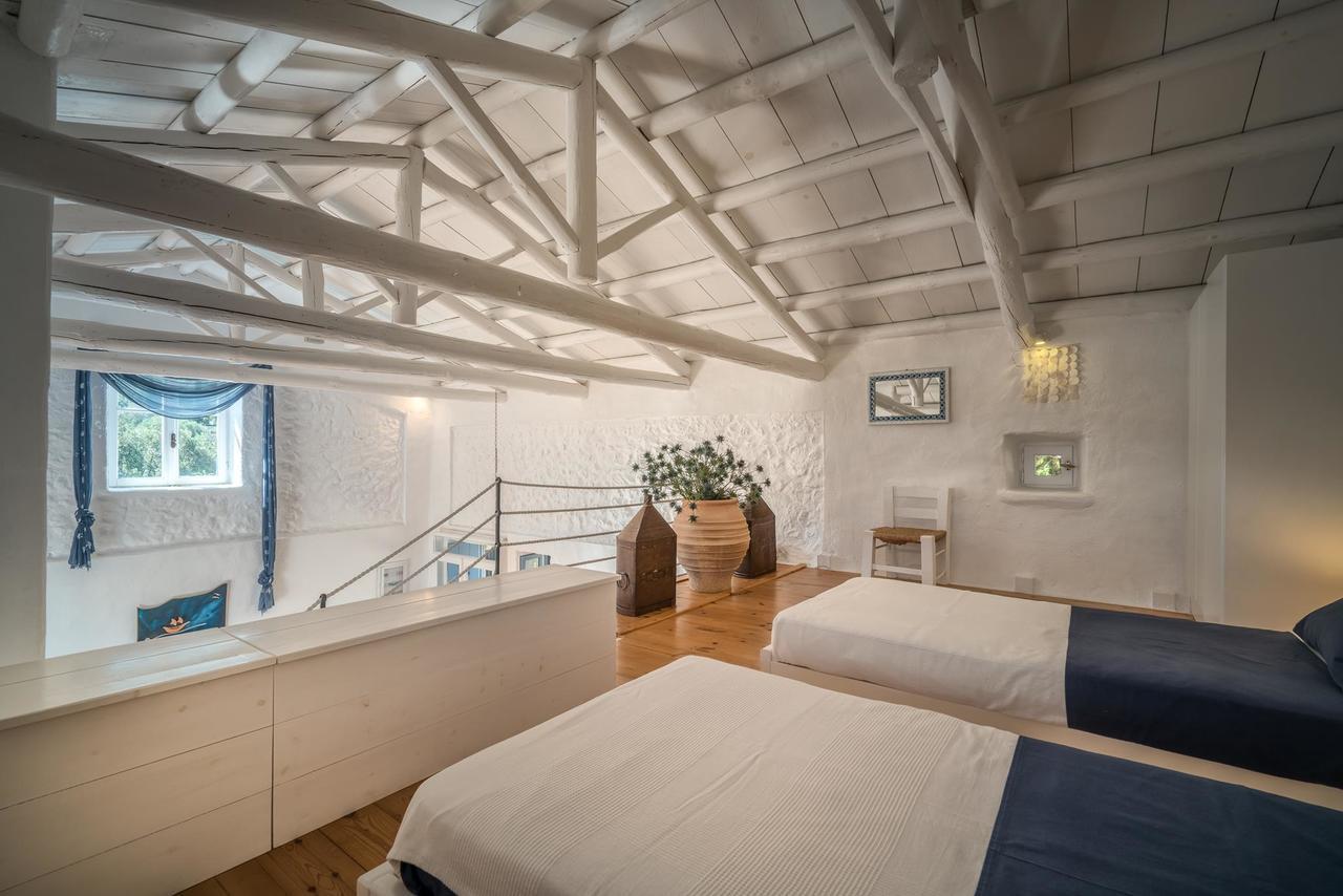 Askos Stone Villa - The Island Panorama อายิโอสนิโกลาโอส ภายนอก รูปภาพ
