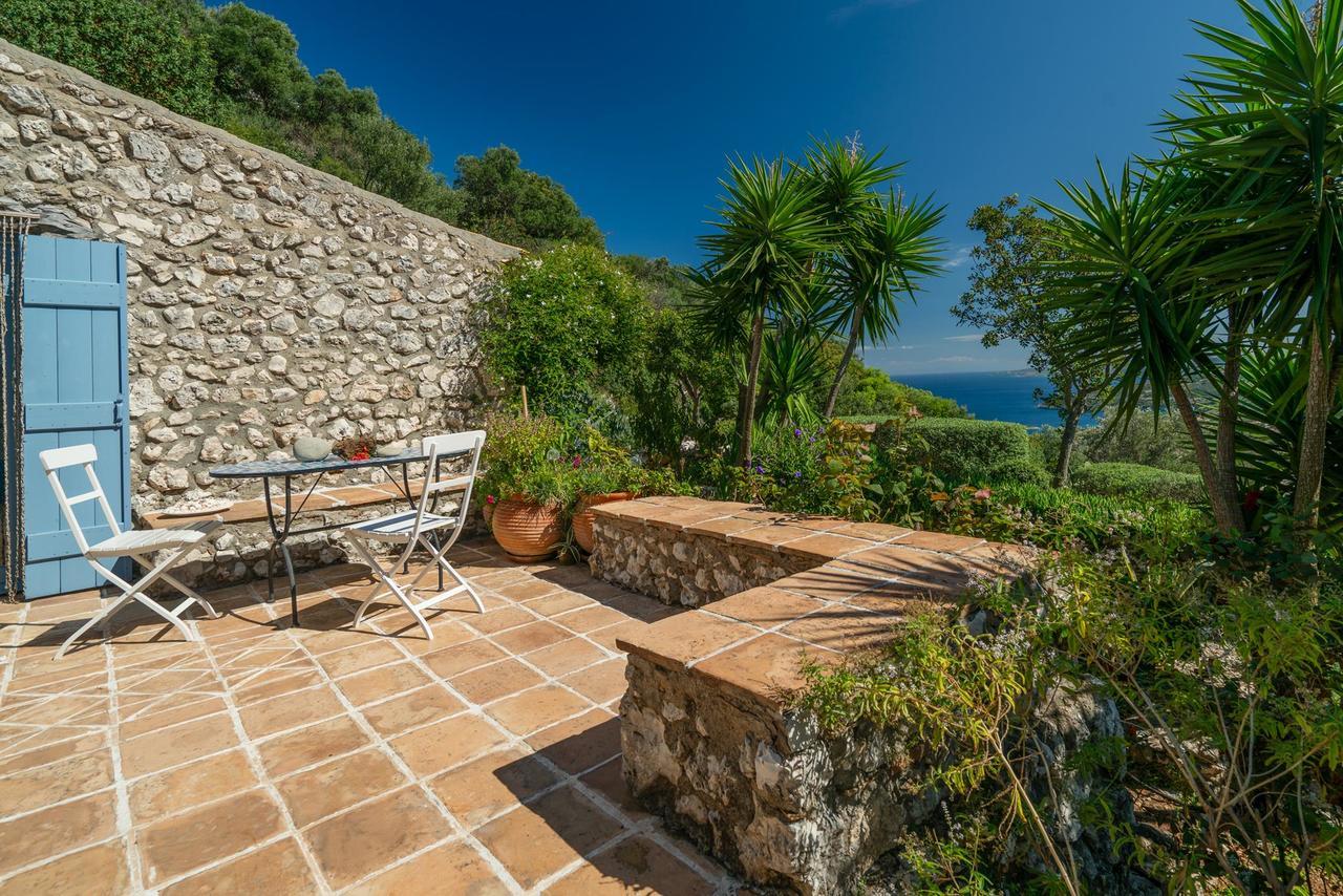 Askos Stone Villa - The Island Panorama อายิโอสนิโกลาโอส ภายนอก รูปภาพ