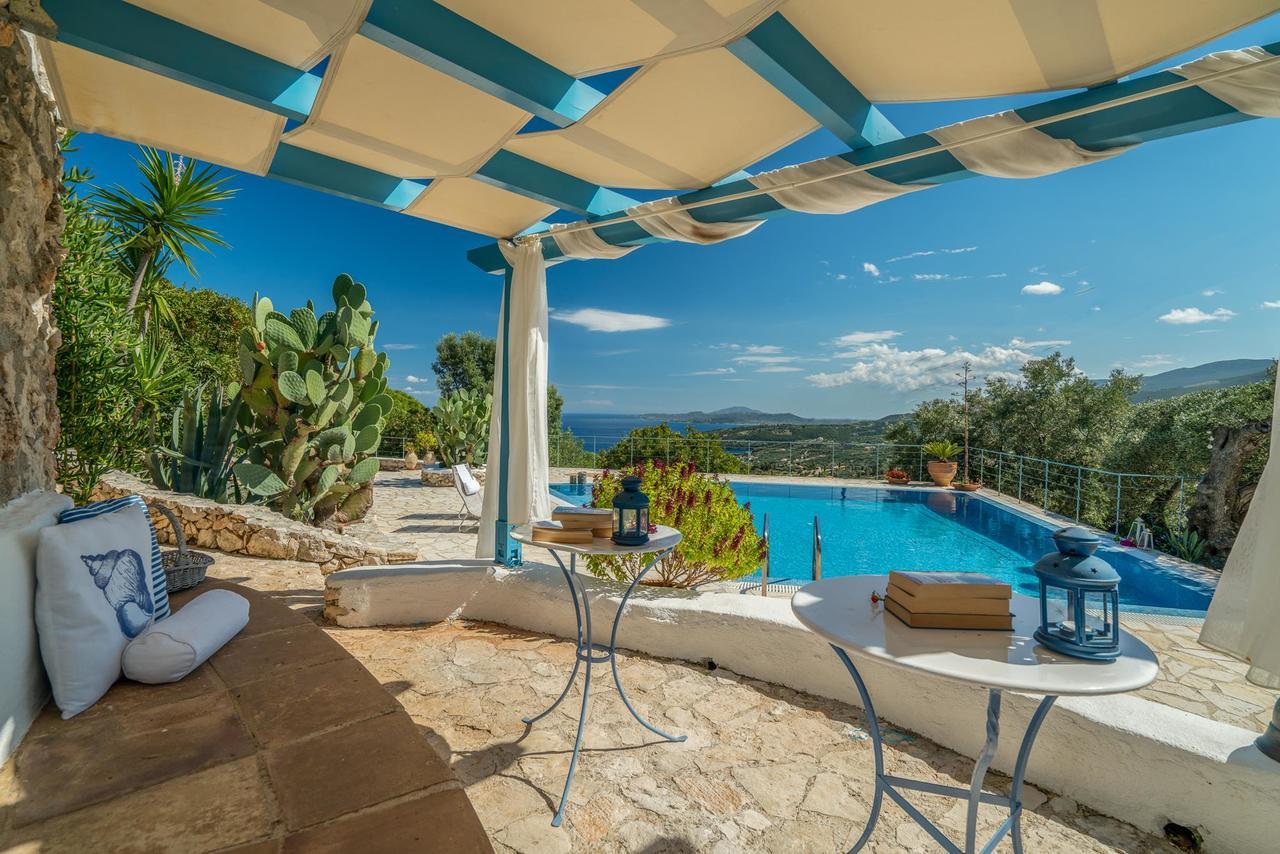 Askos Stone Villa - The Island Panorama อายิโอสนิโกลาโอส ภายนอก รูปภาพ