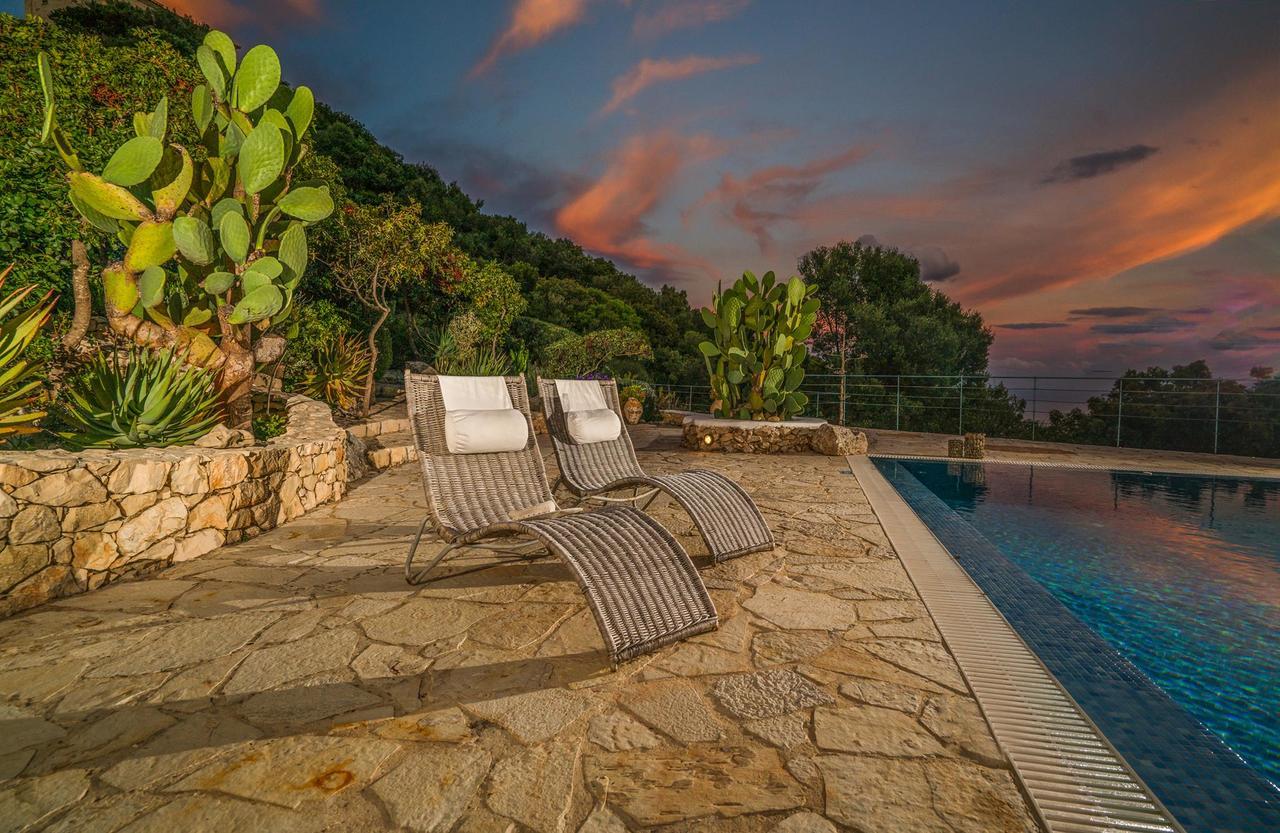Askos Stone Villa - The Island Panorama อายิโอสนิโกลาโอส ภายนอก รูปภาพ